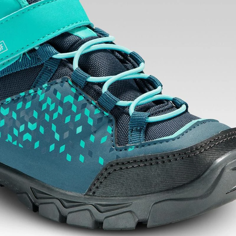 Waterdichte wandelschoenen voor kinderen MH120 mid 28 tot 34 turquoise Quechua Waterdichte Wandelschoenen Voor Kinderen MH120 Mid 28 Tot 34 Turquoise -decathlon winkel waterdichte wandelschoenen voor kinderen mh120 mid 28 tot 34 turquoise 5